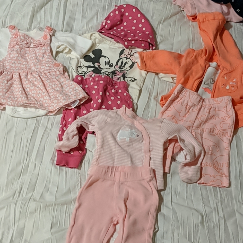 4 piece Newborn Bundle. Gently Worn